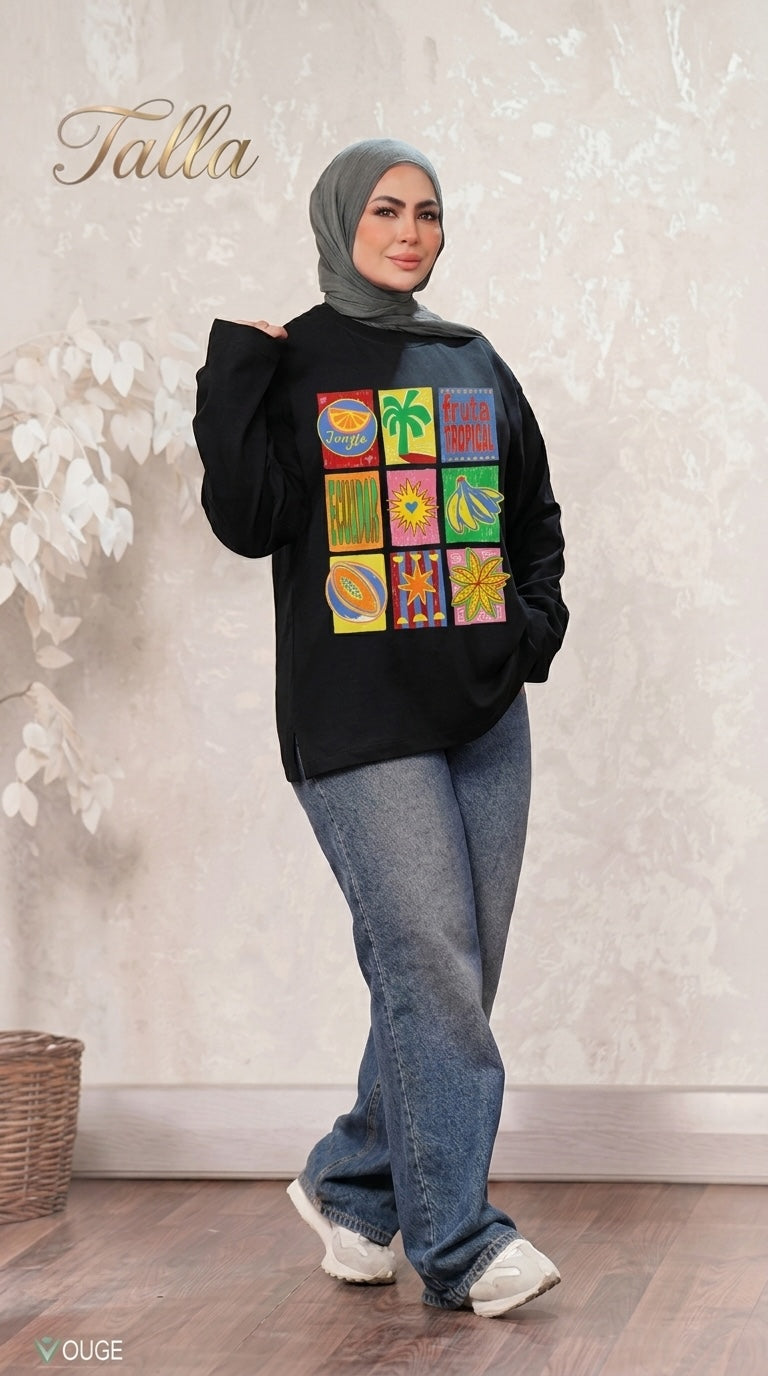 Talla | طلةّ black long sleeve sweatshirt with tropical grid graphic print worn by a woman in a hijab and jeans