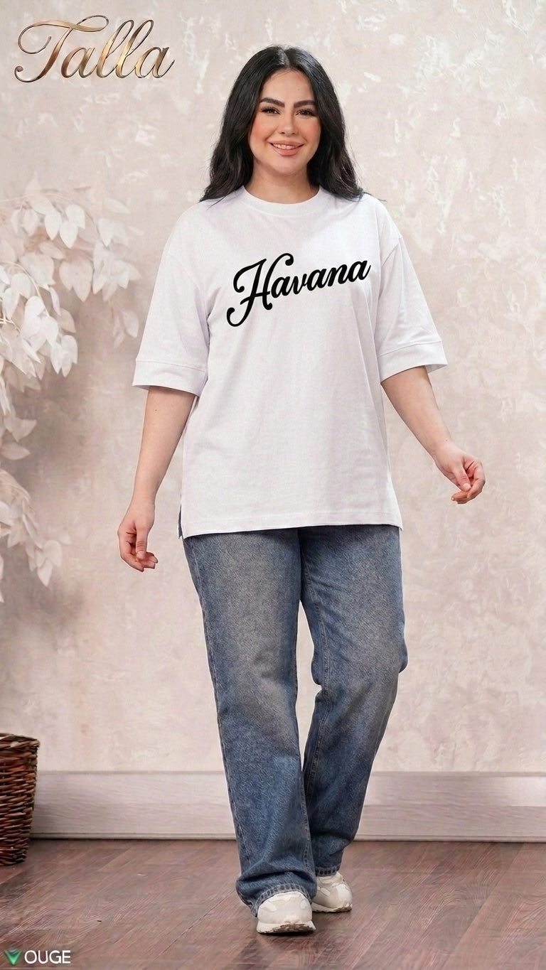 Talla | طلةّ white oversized Havana graphic t-shirt with crew neck and elbow-length sleeves worn by a smiling woman
