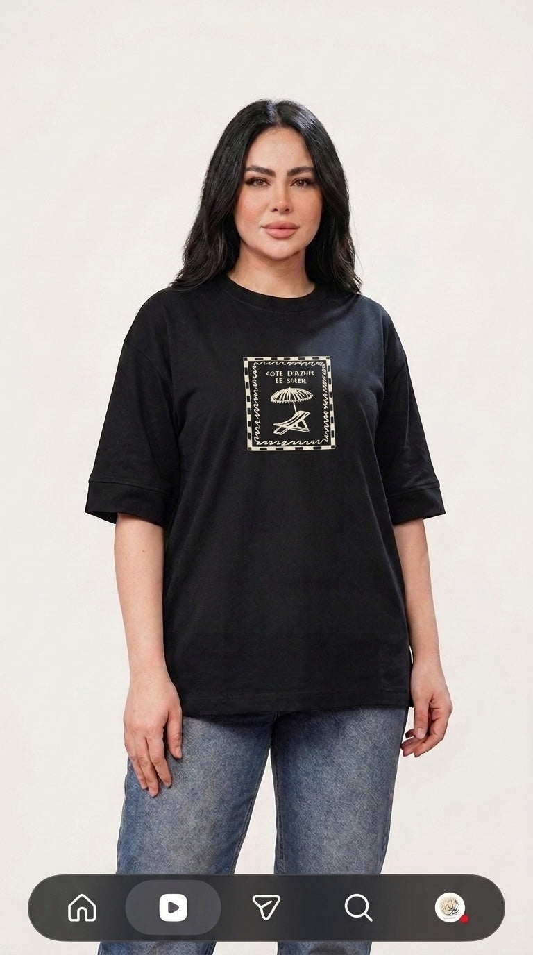 Talla | طلةّ black oversized cotton t-shirt with a vintage-inspired Cote d'Azur sun lounger graphic print