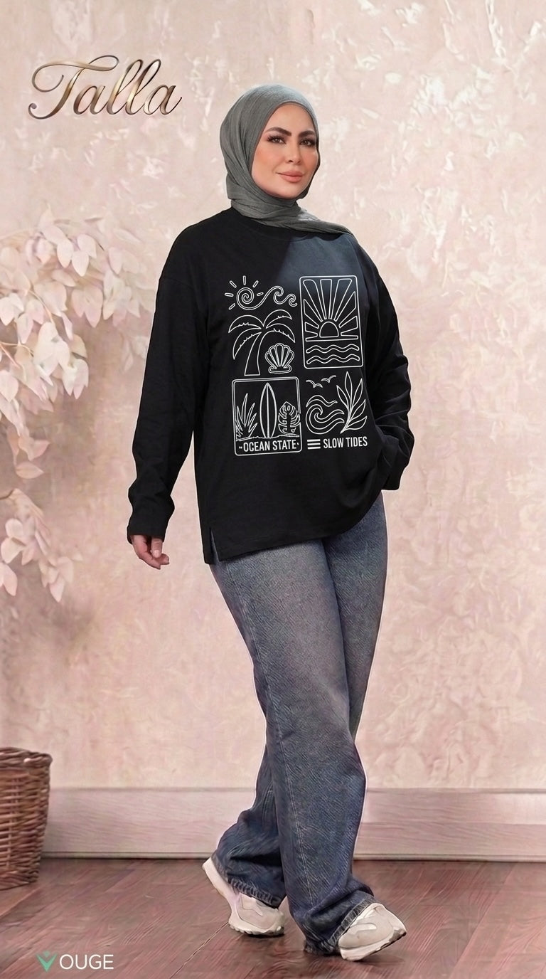 Talla | طلةّ black long sleeve sweatshirt with white Ocean State graphic print worn by a woman in a grey hijab