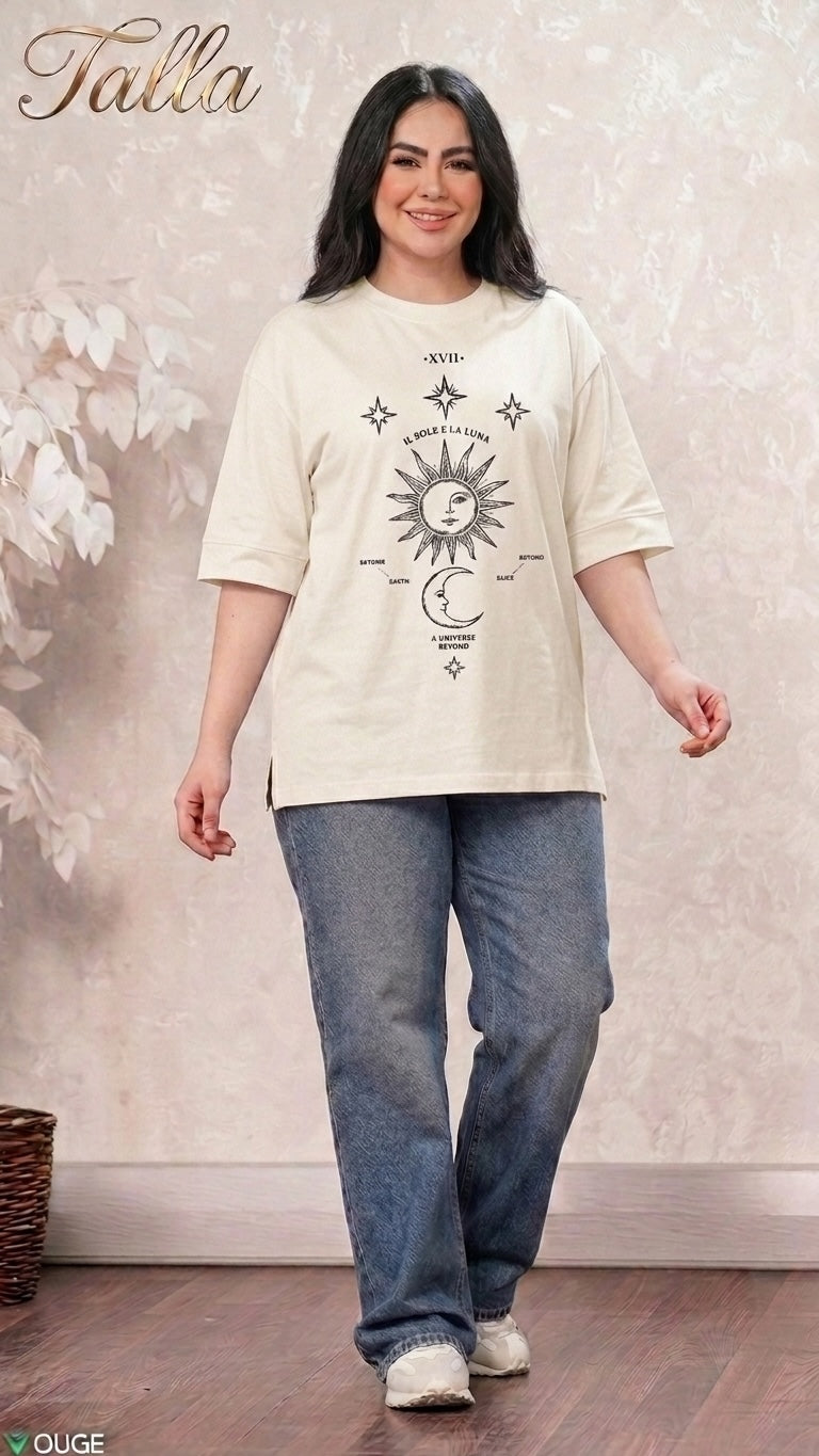 Talla | طلةّ oversized cream t-shirt with black celestial sun and moon graphic print worn by a smiling woman