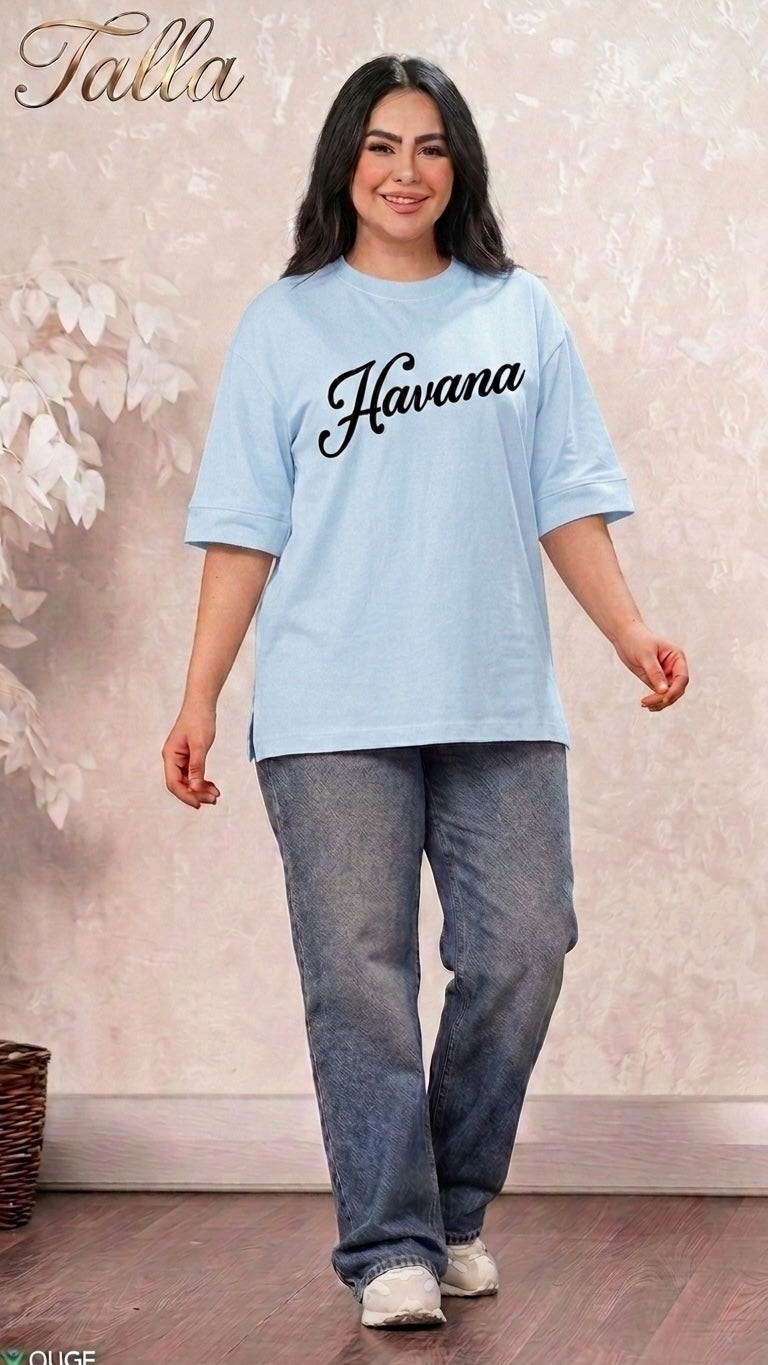 Talla | طلةّ light blue oversized Havana graphic t-shirt with crew neck and elbow sleeves worn with blue denim jeans
