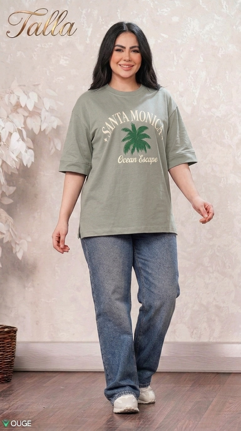 Talla | طلةّ sage green oversized cotton t-shirt with Santa Monica palm tree graphic, crew neck, and side slits.