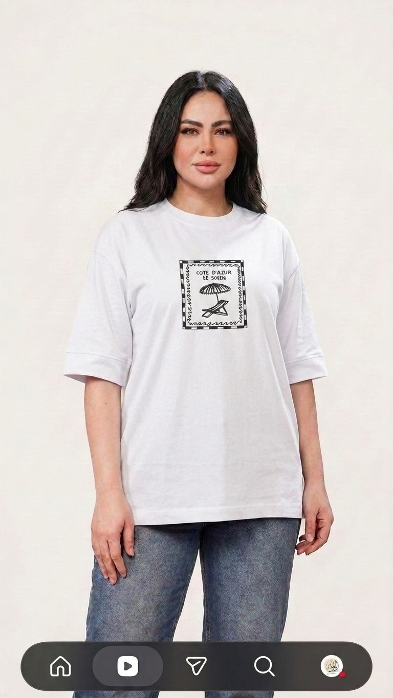 Talla | طلةّ white oversized cotton t-shirt with a vintage-inspired Cote d'Azur sun lounger graphic print