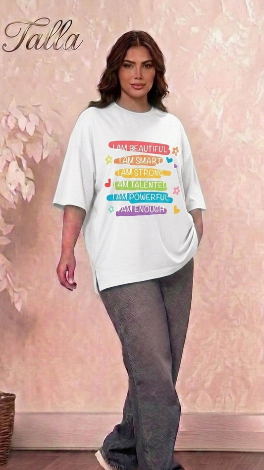 Talla | طلةّ white oversized cotton t-shirt with colorful inspirational graphic print and side slits worn by a model