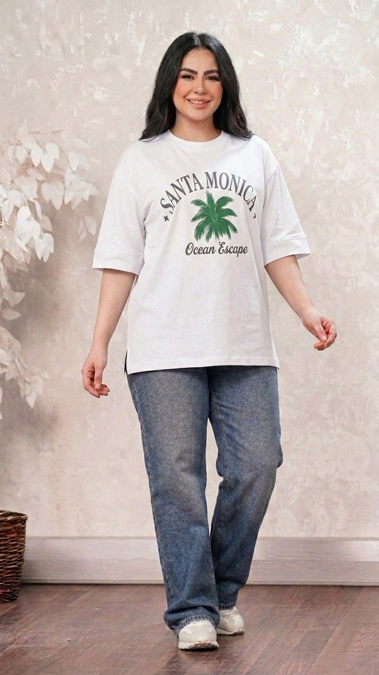 Talla | طلةّ white oversized cotton t-shirt with Santa Monica palm tree graphic, crew neck, and side-slit hem.